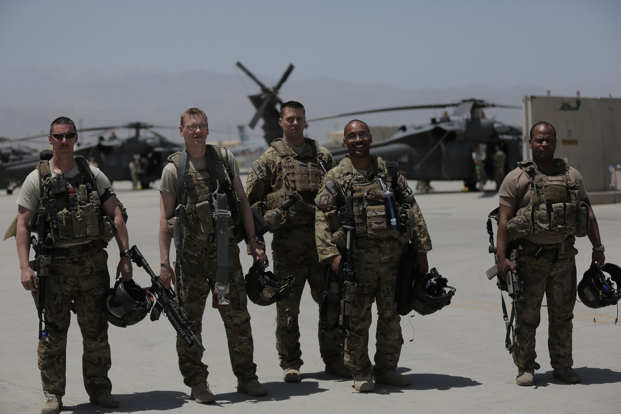 Morning shift Air Crew members pose on the flight line at Bagram Air Field after their shift has ended.(Courtesy Photo by National Geographic Television/Sean Smith)
