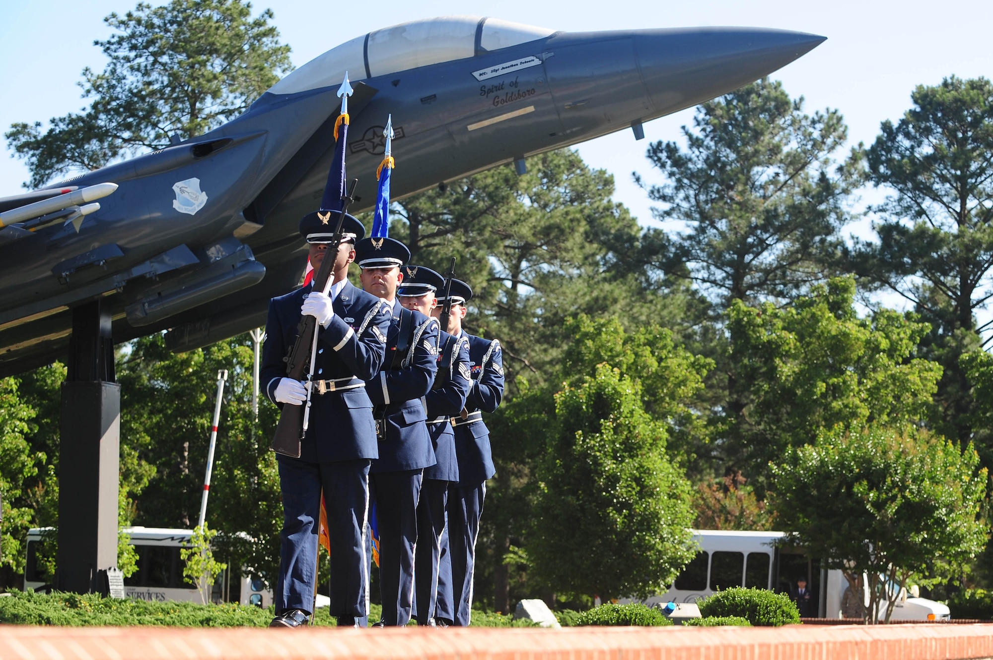 4th Fighter Wing honor guardsmen prepare to present the colors at the 4th FW change of command ceremony, June 2, 2014, at Seymour Johnson Air Force Base, North Carolina. During the ceremony, Col. Jeannie Leavitt, the first female to command an active duty Air Force fighter wing, relinquished command to Col. Mark Slocum. (U.S. Air Force photo/Senior Airman John Nieves Camacho)
