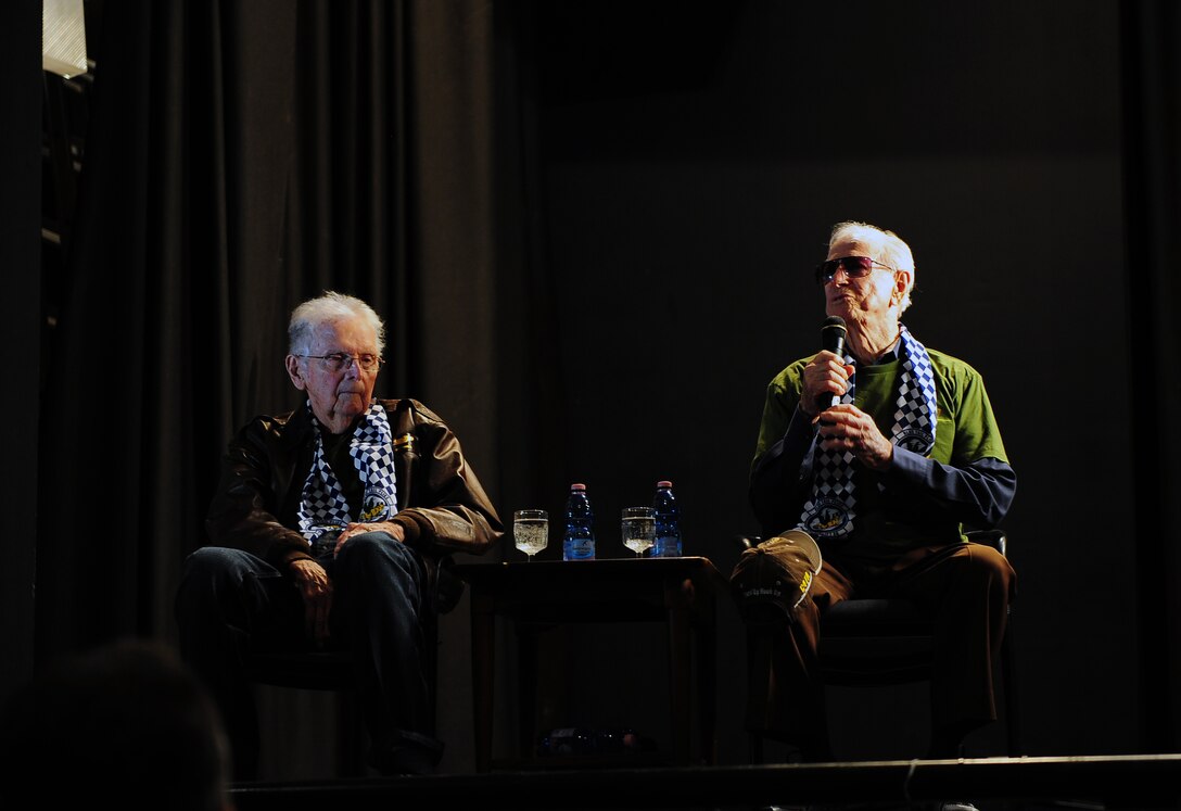 William "Bill" Prindible (left) and Julian "Bud" Rice, World War II veterans and former 37th Troop Carrier Squadron C-47 Skytrain pilots, answer questions from members of Team Ramstein. Rice and Prindible were invited by the 37th Airlift Squadron to participate in events commemorating the 70th anniversary of the D-Day invasion of Normandy. (U.S. Air Force photo/Staff Sgt. Kris Levasseur)
