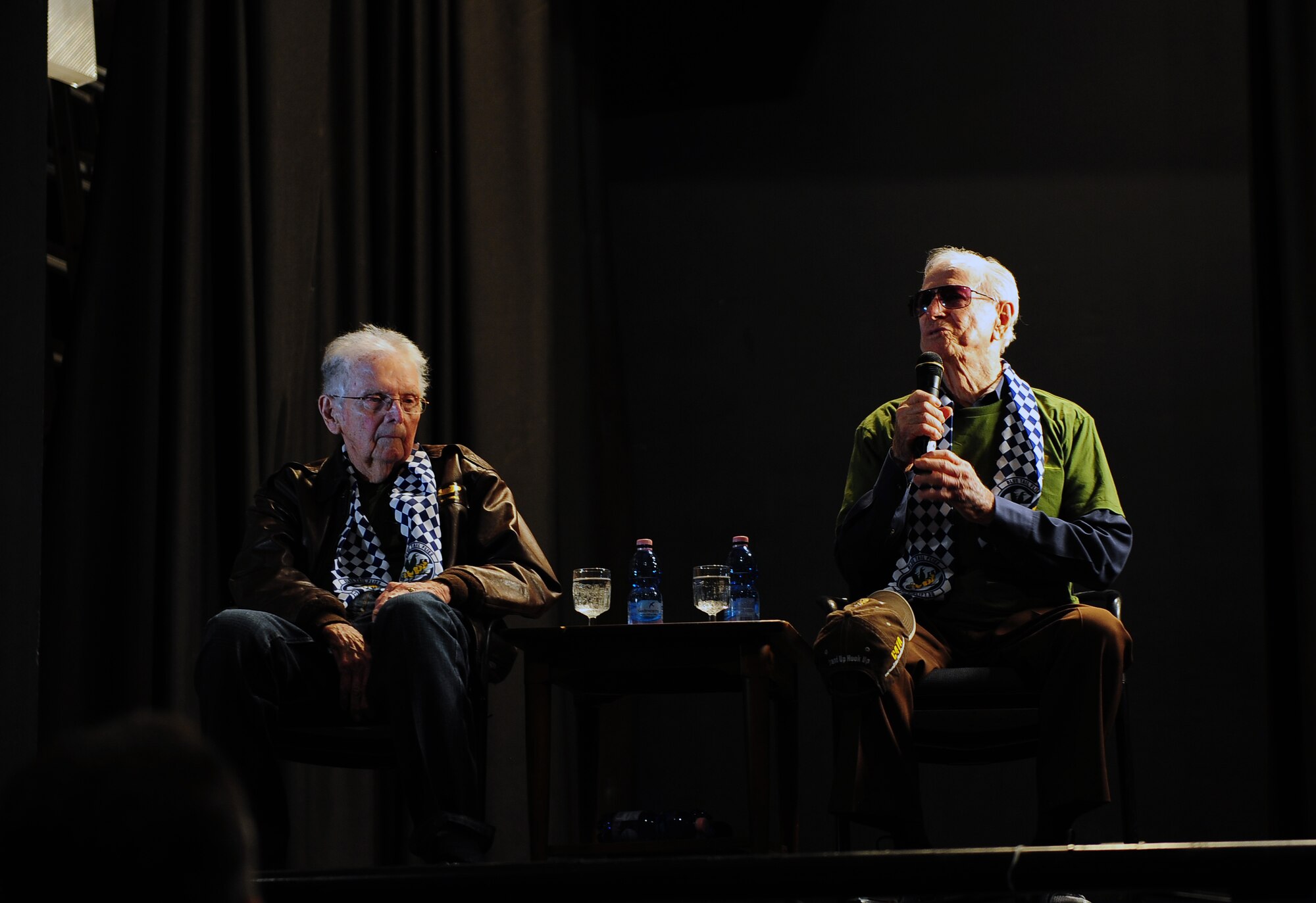 William "Bill" Prindible (left) and Julian "Bud" Rice, World War II veterans and former 37th Troop Carrier Squadron C-47 Skytrain pilots, answer questions from members of Team Ramstein. Rice and Prindible were invited by the 37th Airlift Squadron to participate in events commemorating the 70th anniversary of the D-Day invasion of Normandy. (U.S. Air Force photo/Staff Sgt. Kris Levasseur)
