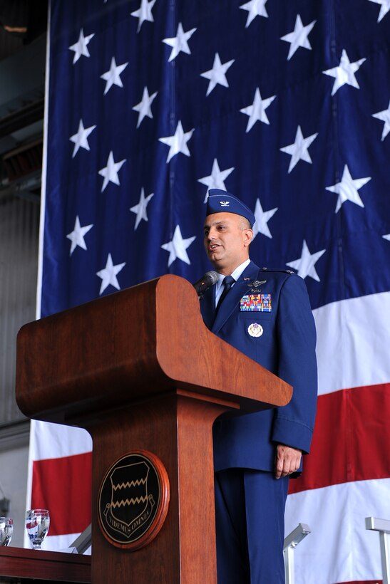 U.S Air Force Col. Mohan Krishna speaks to members of the 55th Wing after assuming command of the 55th Operations Group. This is Krishna's ninth assignment at Offutt during his 22 year Air Force career. (U.S. Air Force photo by Josh Plueger/Released)
