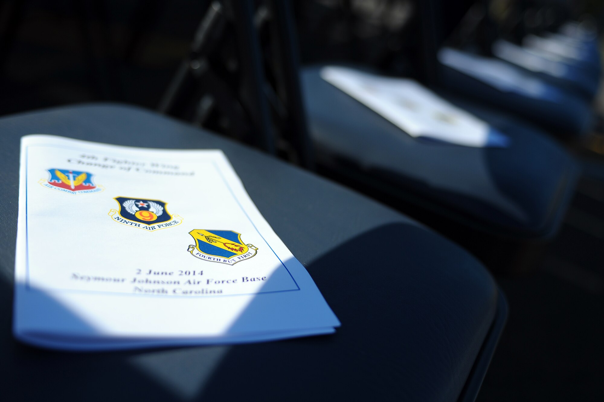 Col. Mark Slocum assumed command from Col. Jeannie Leavitt during the 4th Fighter Wing change of command ceremony, June 2, 2014, at Seymour Johnson Air Force Base, North Carolina. Slocum was assigned to Seymour Johnson twice before and logged more than 2600 flight hours, including 925 combat hours and 252 combat sorties. (U.S. Air Force photo/Tech. Sgt. Brittany E. Jones)