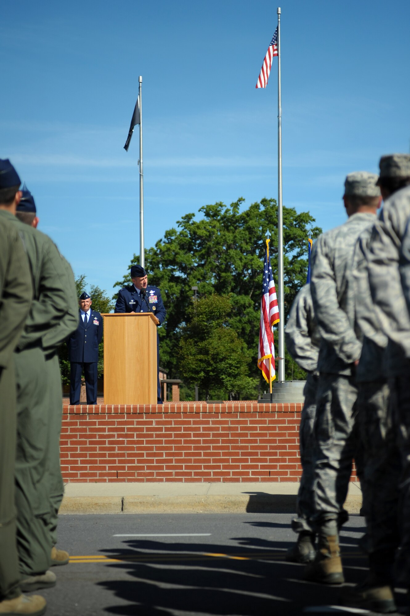 Col. Mark Slocum, new 4th Fighter Wing commander, speaks during the wing change of command ceremony, June 2, 2014, at Seymour Johnson Air Force Base, North Carolina. Slocum was assigned to Seymour Johnson twice before and logged more than 2600 flight hours, including 925 combat hours and 252 combat sorties. (U.S. Air Force photo/Tech. Sgt. Brittany E. Jones)