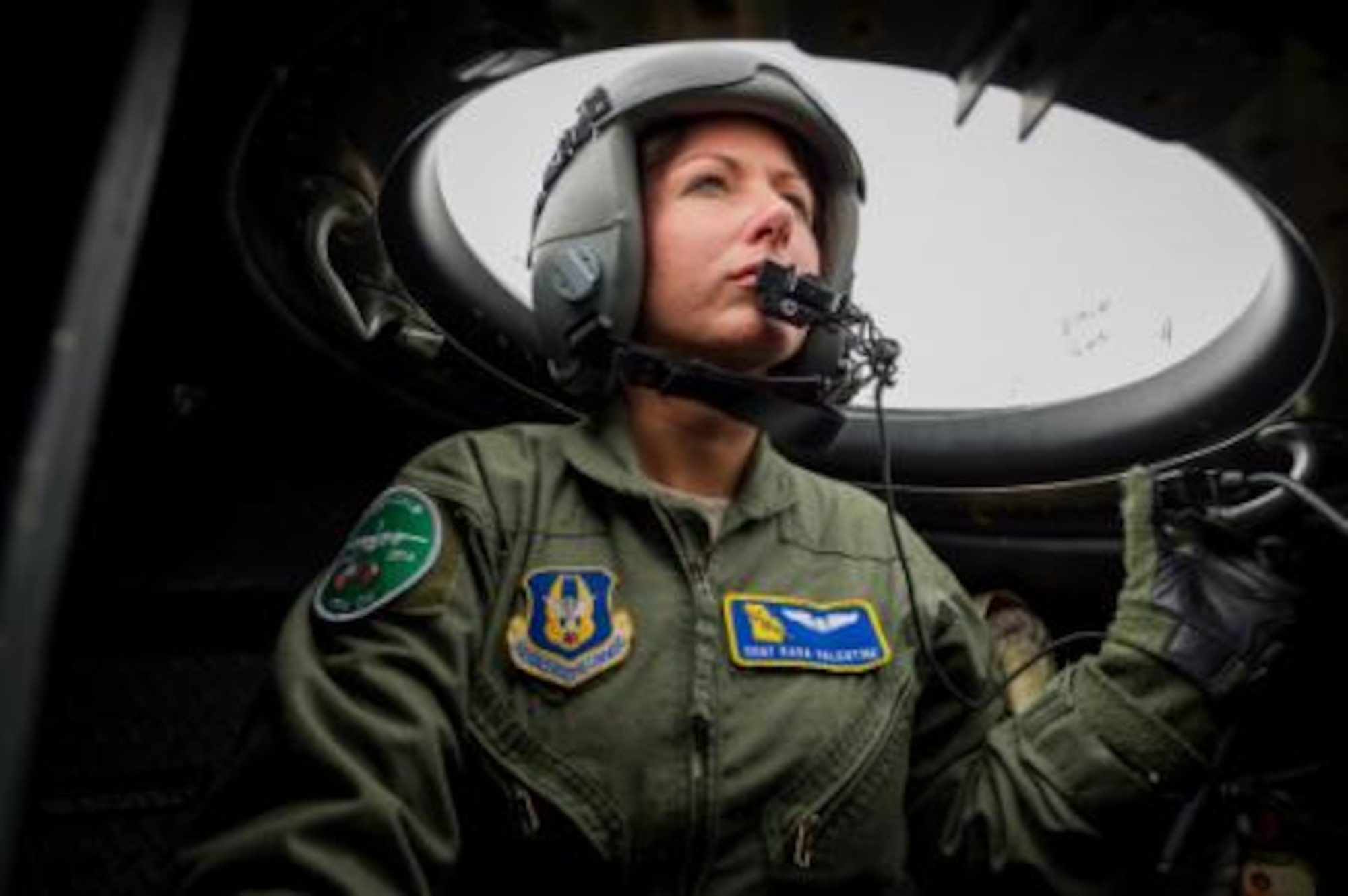 U.S. Air Force Staff Sgt. Kara Valentine, C-130 Hercules loadmaster with the 94th Airlift Wing, Dobbins Air Reserve Base, Ga., watches for threats in the observation bubble during Maple Flag 47 in Edmonton/Cold Lake, Alberta, Canada, May 27, 2014. Maple Flag is an international exercise designed to enhance the interoperability of C-130 aircrews, maintainers and support specialists in a simulated combat environment. (U.S. Air Force photo by Master Sgt. John R. Nimmo, Sr./Released)