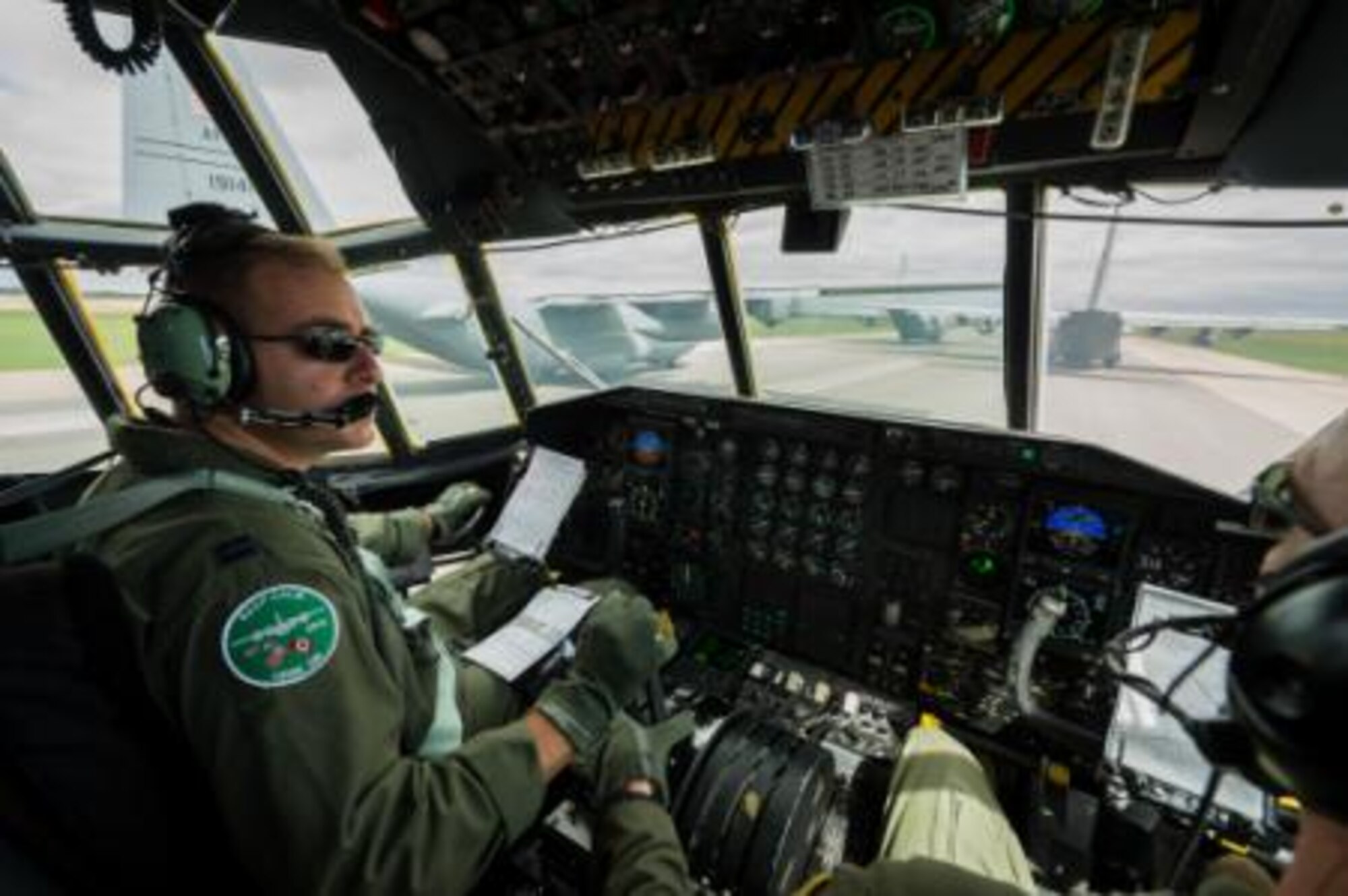 U.S. Air Force Capt. Brian Metzger, C-130 Hercules pilot with the 94th Airlift Wing, Dobbins Air Reserve Base, Ga., taxis into position on the runway during Maple Flag 47 in Edmonton/Cold Lake, Alberta, Canada, May 27, 2014. Maple Flag is an international exercise designed to enhance the interoperability of C-130 aircrews, maintainers and support specialists in a simulated combat environment. (U.S. Air Force photo by Master Sgt. John R. Nimmo, Sr./Released)