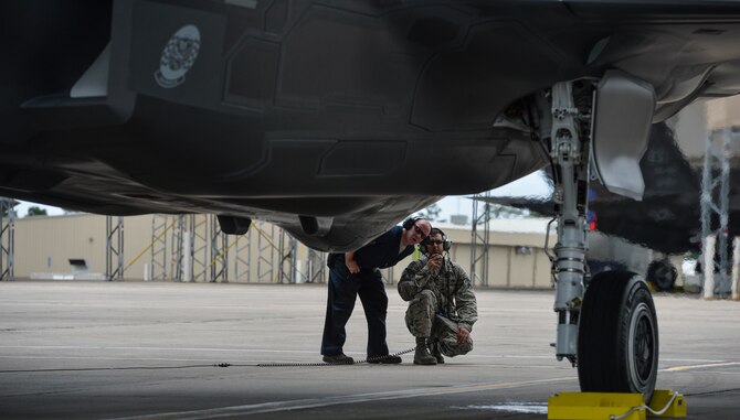 Airmen from the 58th Aircraft Maintenance Unit look over the 26th and final F-35A Lightning II assigned to the 33rd Fighter Wing on Eglin Air Force Base, Fla., May 28, 2014. The arrival of the final F-35A marks a shift in priorities for the 58th Fighter Squadron and 58th AMU, since the first F-35A was delivered in July 2011. (U.S. Air Force photo/Senior Airman Christopher Callaway)




