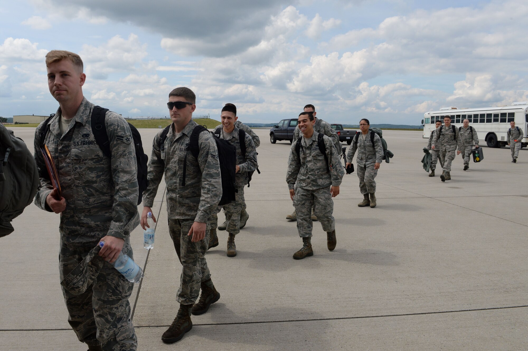 U.S. Air Force Airmen with the 480th Fighter Squadron board a U.S. Air Force C-17 Globemaster III cargo aircraft to travel to U.S. Air Force Aviation Detachment, Poland, from Spangdahlem Air Base, Germany, for a planned rotation May 29, 2014. The goal of these rotations is to increase cooperation between the U. S. and Polish air forces and strengthen interoperability as NATO allies through regular combined training exercises and military-to-military engagement. (U.S. Air Force photo by Senior Airman Alexis Siekert/Released)
