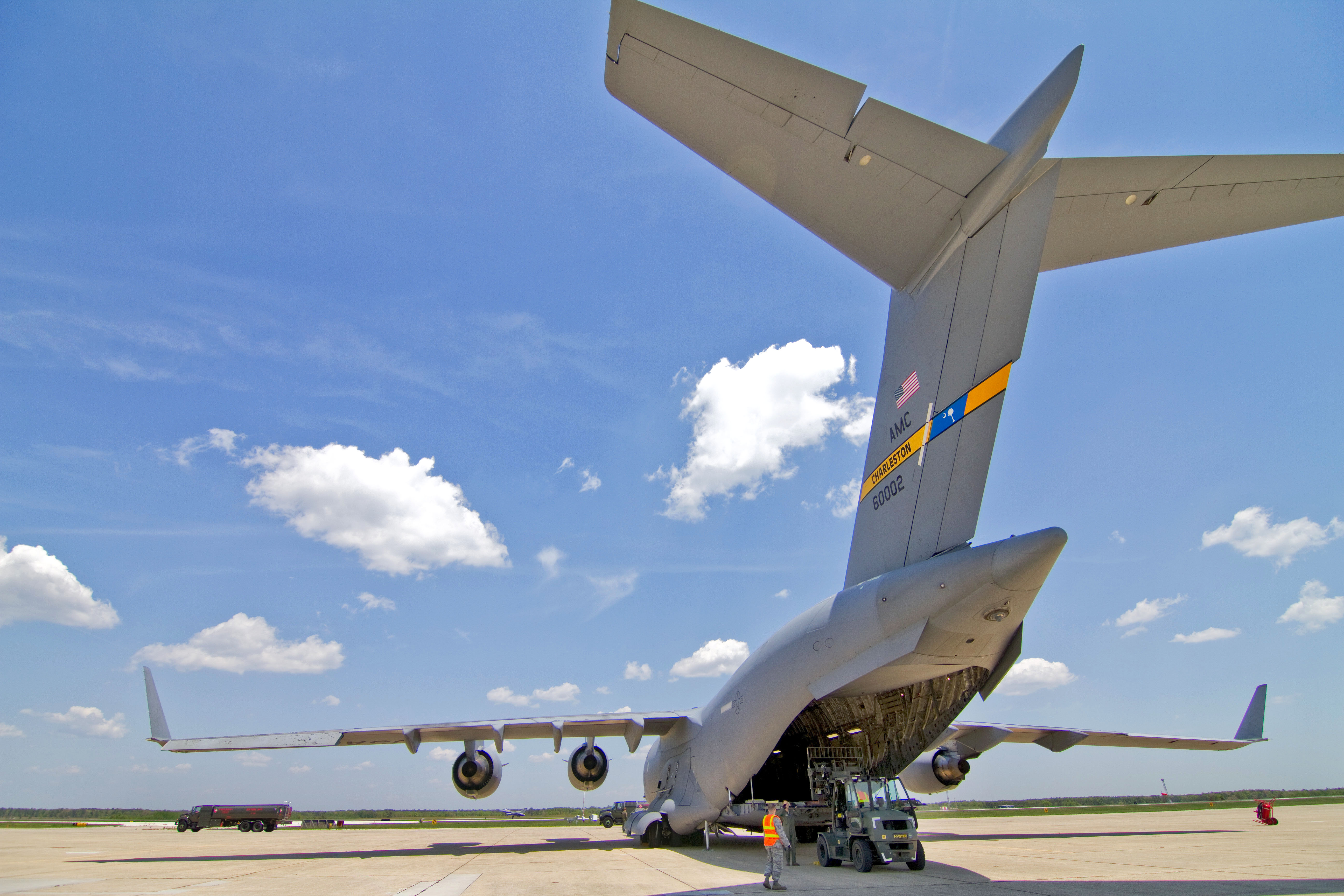 Airmen load cargo onto a C17 Globemaster III aircraft at Atlantic City