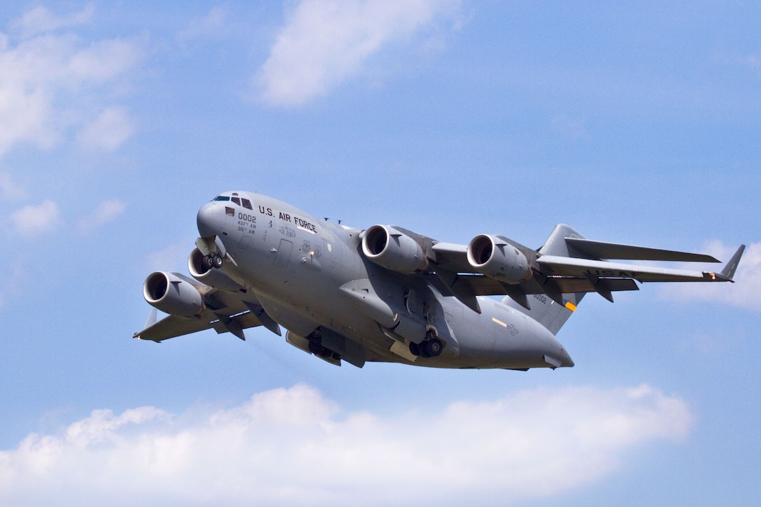 An Air Force C-17 Globemaster III aircraft carrying Airmen and cargo takes off from Atlantic City International Airport, N.J., May 20, 2014.