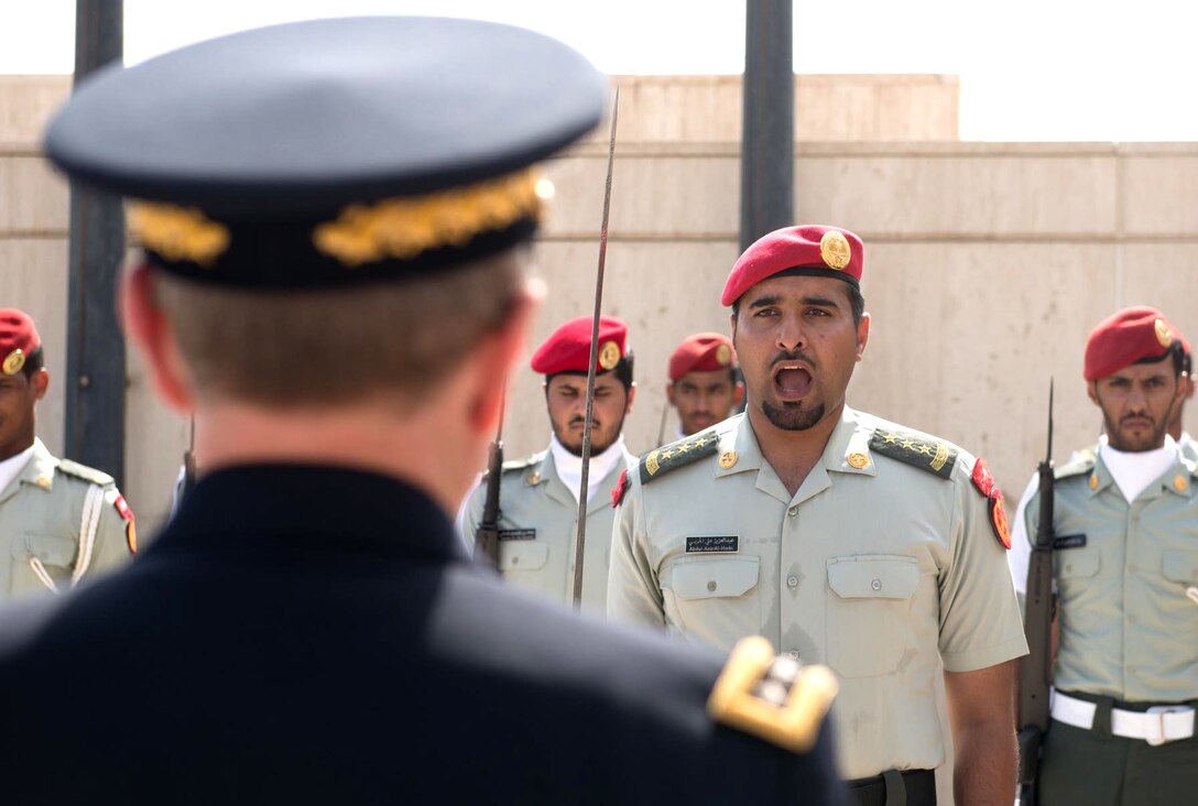 U.S. Army Gen. Martin E. Dempsey, chairman of the Joint Chiefs of Staff, observes honor guard service members at the Saudi Arabian Air Force Institute in Jeddah, Saudi Arabia, June 2, 2014. 