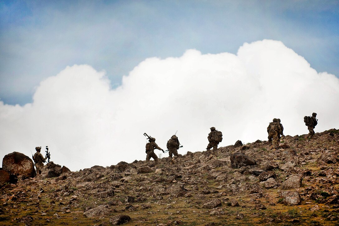 U.S. paratroopers serving as an overwatch element move their observation post higher on a hill during combat operations in Ghazni province, Afghanistan, May 19, 2012. The paratroopers are assigned to the 82nd Airborne Division’s 3rd Squadron, 73rd Cavalry Regiment, 1st Brigade Combat Team.  
