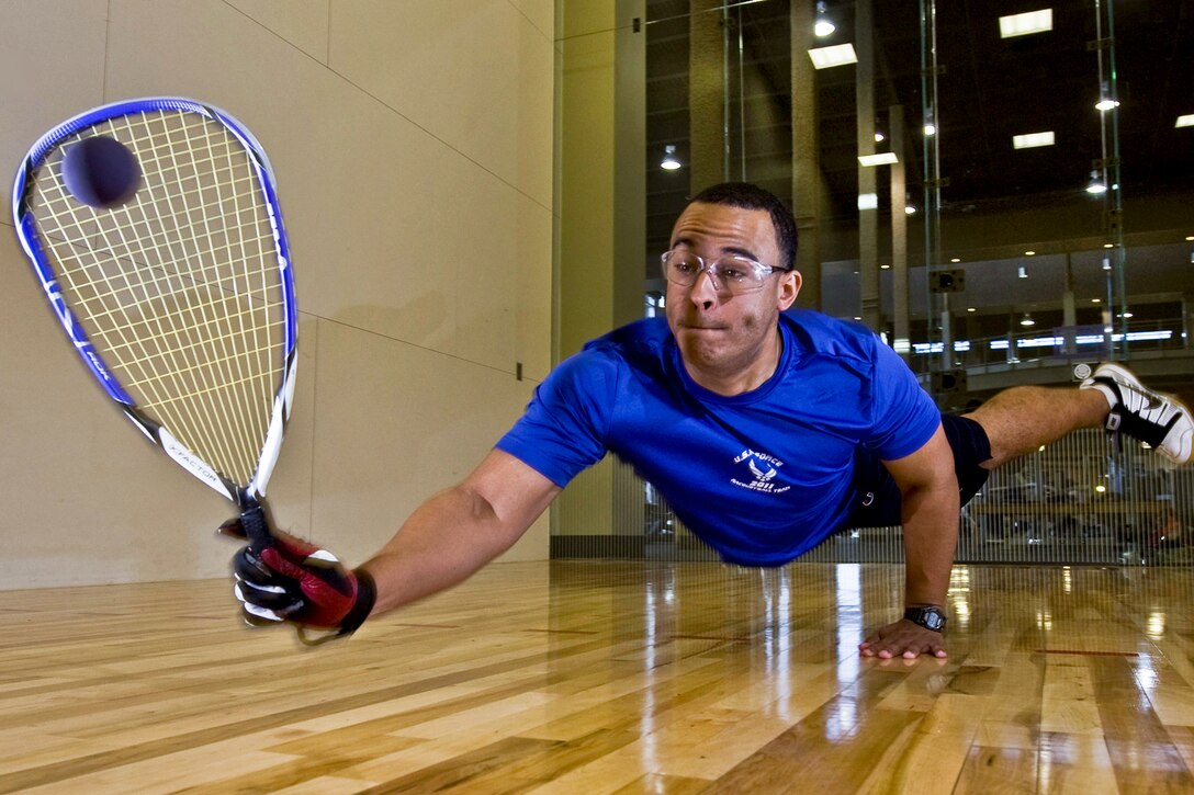 Air Force 2nd Lt. Maurice McKoy dives to hit a raquetball on Nellis Air Force Base, Nev., May 17, 2012. The chief of Air Force sports picked McKoy, who has played competitive racquetball for more than 12 years, to represent the Air Force in the 45th National Racquetball Singles Championship in Fullerton, Calif. McKoy is a 99th Comptroller Squadron financial officer.  
