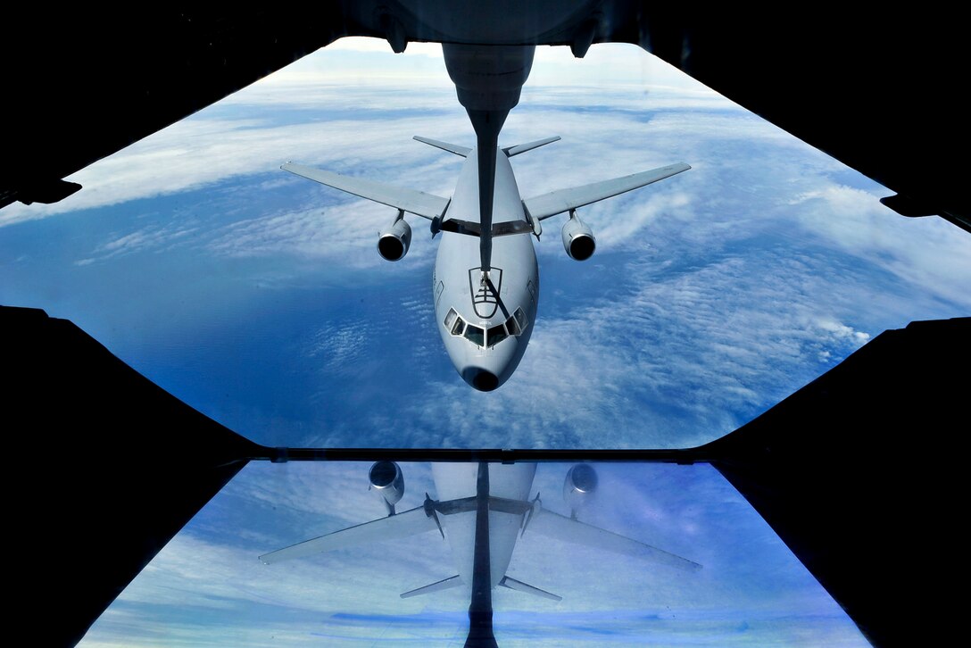 A KC-10 Extender refuels another KC-10 during a training mission over the Atlantic Ocean, May 3, 2012. The aircraft, both assigned to the 305th Air Mobility Wing on Joint Base McGuire-Dix-Lakehurst, N.J., conducted aerial refueling operations to maintain proficiency for worldwide duties.  
