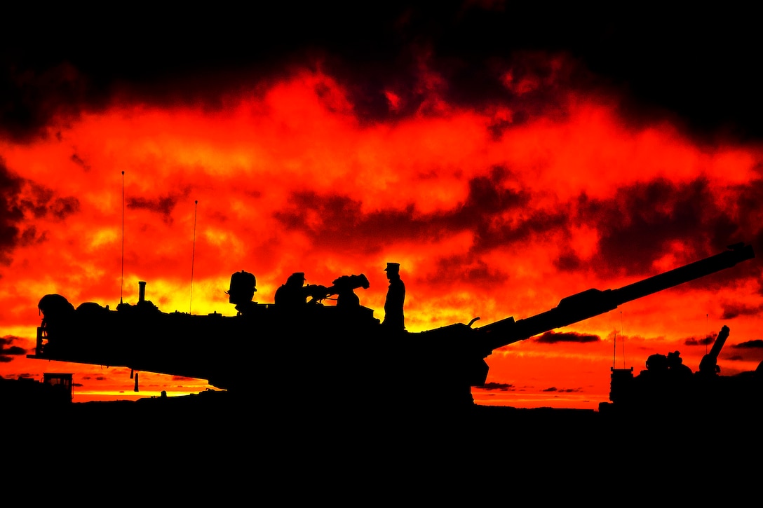 U.S. Marines clean their M1A1 Abrams battle tank after a day of training during Exercise African Lion 2012 on Cap Draa, Morocco, April 10, 2012. The Marines are assigned to the 4th Tank Battalion, 24th Marine Expeditionary Unit.  
