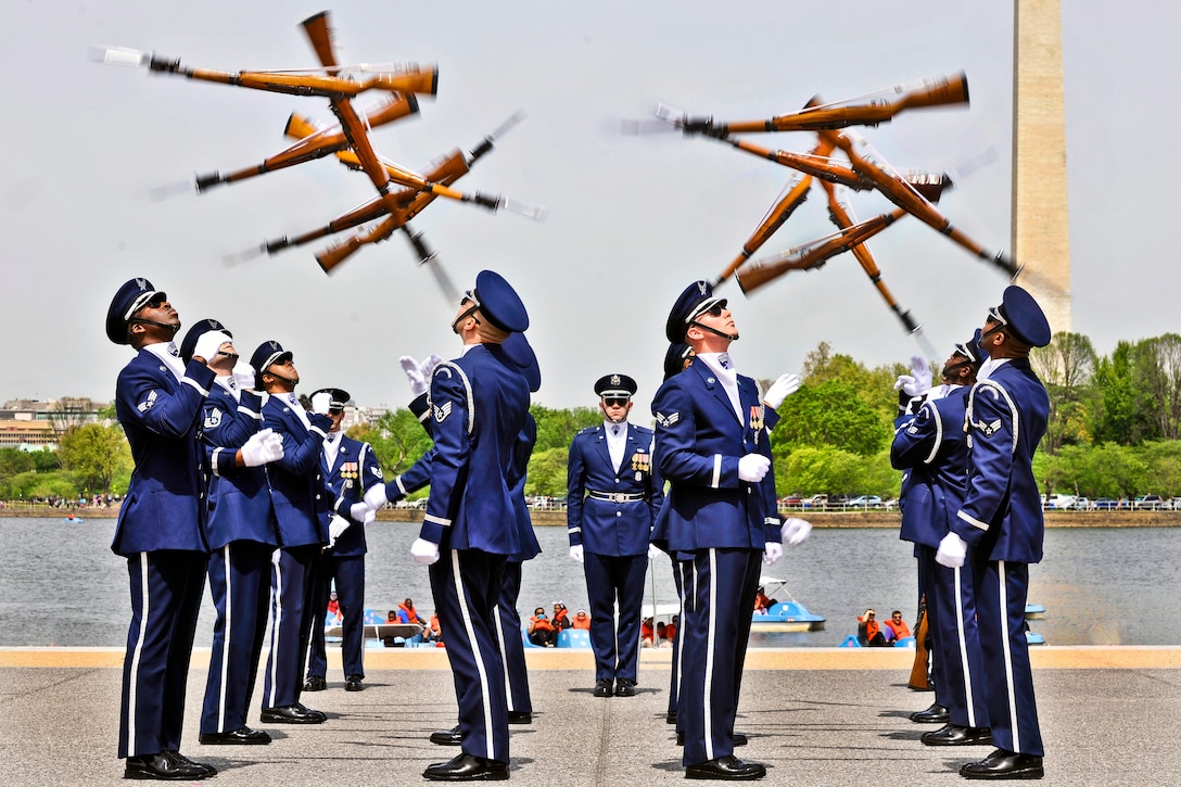 The Air Force Honor Guard Drill Team competes during the Joint Service Drill Exhibition at the Jefferson Memorial in Washington, D.C., April 14, 2012. The Air Force team took first place after competing against teams from all four of the armed services including the Merchant Marine Academy.  
