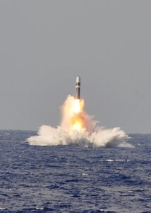 ATLANTIC OCEAN (June 2, 2014) A trident II D-5 ballistic missile is launched from the Ohio-class ballistic missile submarine USS West Virginia (SSBN 736) during a missile test at the Atlantic Missile Range. The test flights were part of a demonstration and shakedown operation, which the Navy uses to certify a submarine for deployment after a major overhaul. The missiles were converted into test configurations with kits containing range safety devices and flight telemetry instrumentation. The U.S. Navy supports U.S. Strategic Command's strategic deterrence missions by operating and maintaining Ohio-class ballistic missile submarines to deter regional and strategic threats. The triad, the U.S. strategic nuclear forces of ICBMs, bombers, and ballistic missile submarines, remains the primary deterrent of nuclear attacks against the U.S., our allies, and partners. (U.S. Navy photo/Released)