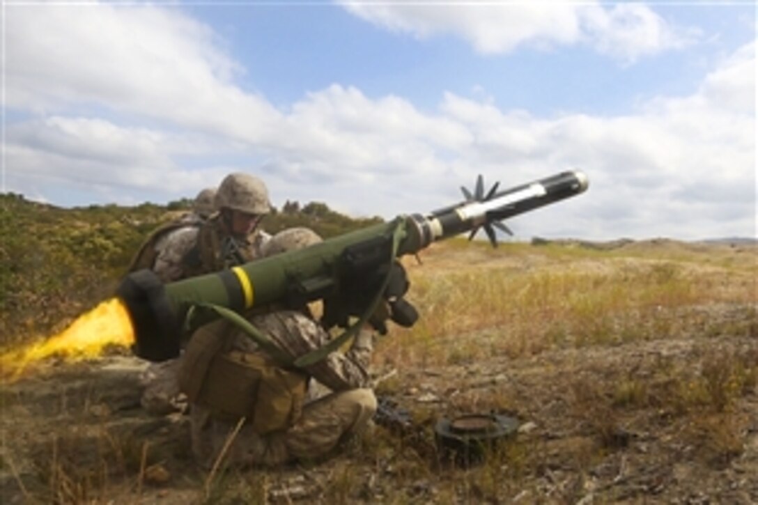 Marine Corps Lance Cpl. Matthew Bottomley fires a FGM-148 Javelin on Camp Pendleton, Calif., May 23, 2014. Bottomley is assigned to the 3rd Battalion, 1st Marine Regiment, and is preparing for his upcoming deployment by employing multiple weapon systems with different support teams.