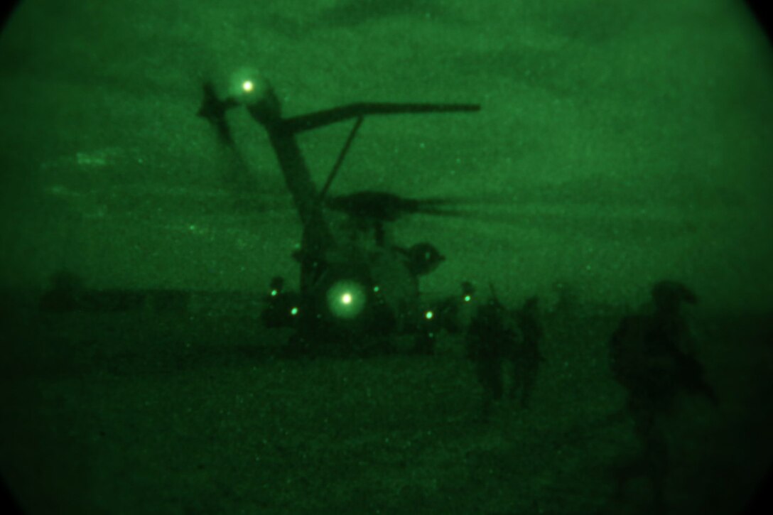 Marines with Bravo Company, 1st Battalion, 7th Marine Regiment, offload from a CH-53E Super Stallion during a mission in Helmand province, Afghanistan, May 15, 2014. The company operated in Larr Village for two days to establish a presence and to disrupt enemy fighters. Throughout the mission the infantrymen conducted several patrols within the village and discovered hazardous materials which could be used to create improvised explosive devices.