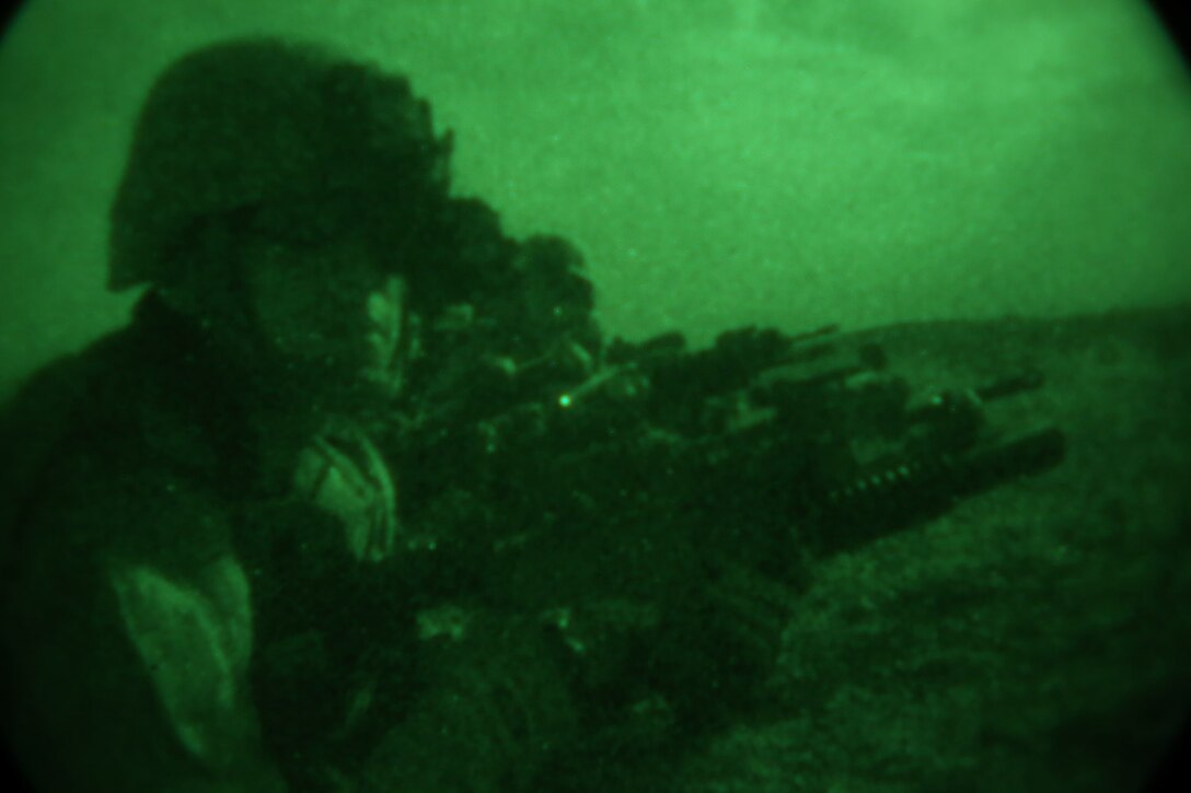 Marines with Bravo Company, 1st Battalion, 7th Marine Regiment, provide security from a wadi after offloading from a CH-53E Super Stallion during a mission in Helmand province, Afghanistan, May 15, 2014. The company operated in Larr Village for two days to establish a presence and to disrupt enemy fighters. Throughout the mission the infantrymen conducted several patrols within the village and discovered hazardous materials which could be used to create improvised explosive devices.