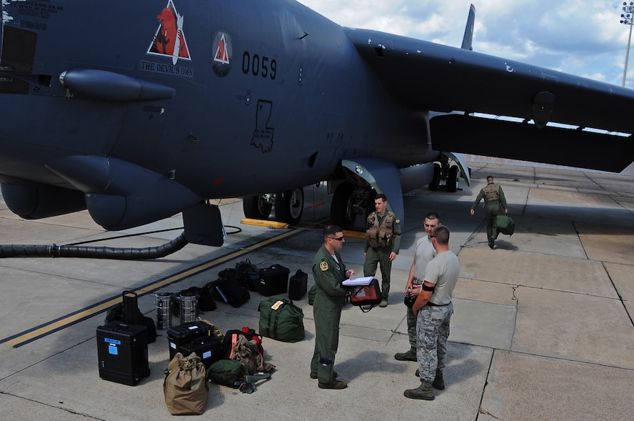 Aircraft maintainers and Aircrew from Barksdale Air Force Base, La., perform a pre-flight inspection, on one of two B-52H Stratofortress bombers prior to departing for a short-term deployment June 3, 2014. B-52s assigned to Barksdale and Minot Air Force Base, N.D., are participating in the deployment and will train and integrate with U.S. and allied military forces in the U.S. European Command area of operations.