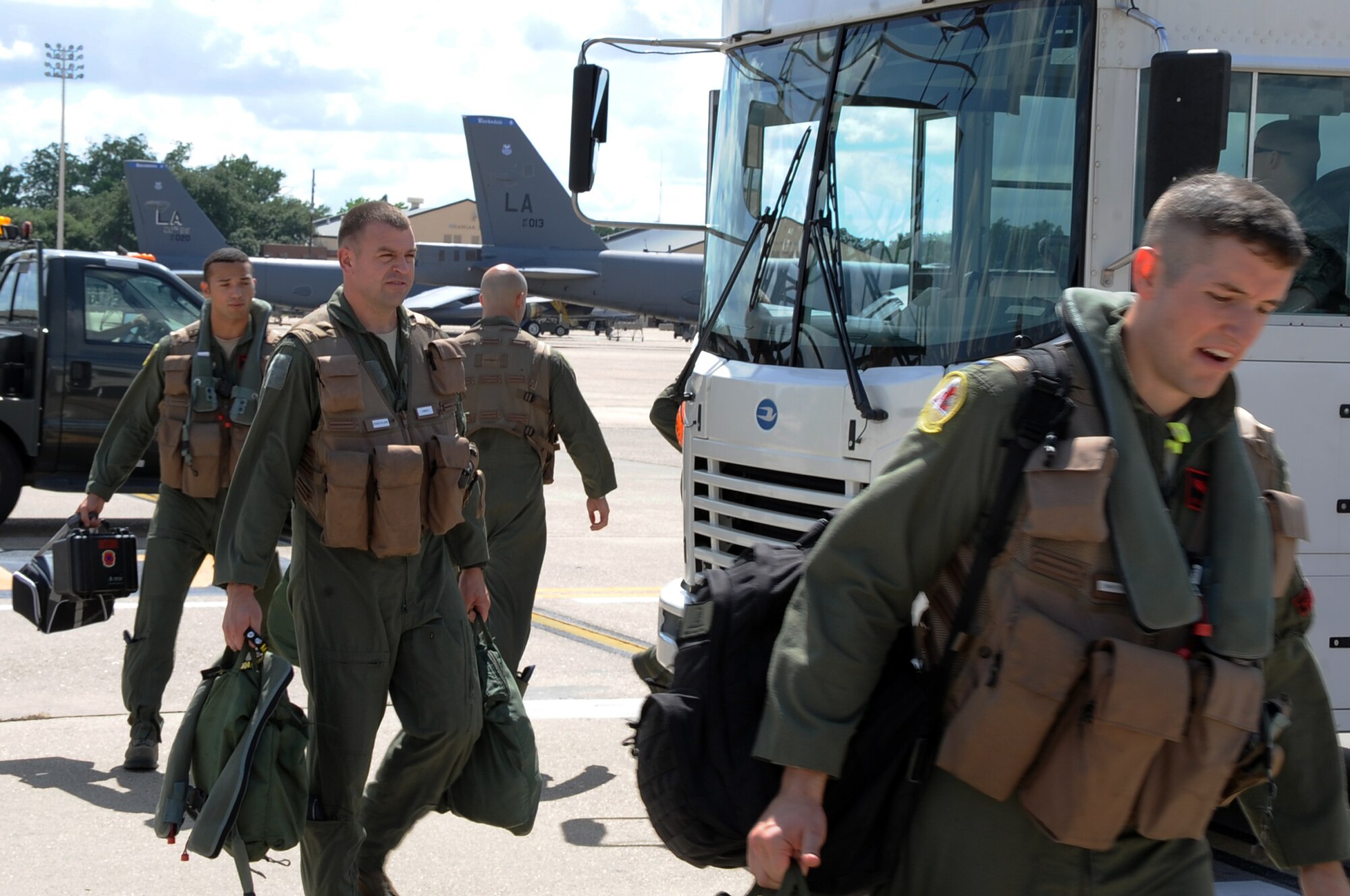 Aircrew members prepare to board a B-52H Stratofortress at Barksdale Air Force Base, La., June 3, 2014, for a short-term deployment to the U.S. European Command area of operations. Two B-52s from Barksdale and one assigned to Minot Air Force Base, N.D., are participating in the deployment and will train and integrate with U.S. and allied military forces in the region.