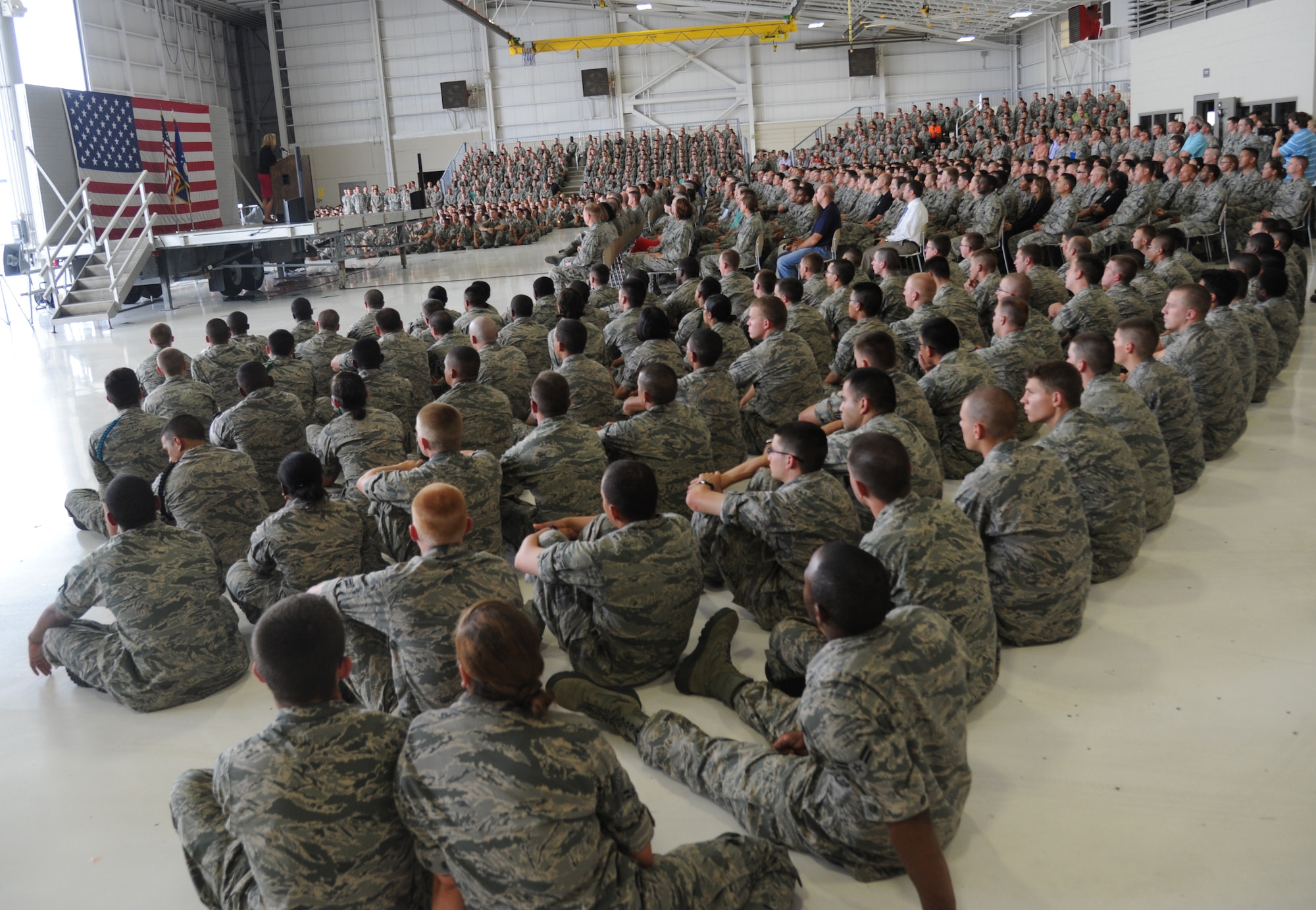 Secretary of the Air Force Deborah Lee James speaks to base personnel during an All Call at the dual bay hangar at Keesler Air Force Base, Miss. following a base orientation visit May 30, 2014. James also toured the Levitow Training Support Facility and the 403rd Wing. (U.S. Air Force photo by Kemberly Groue)