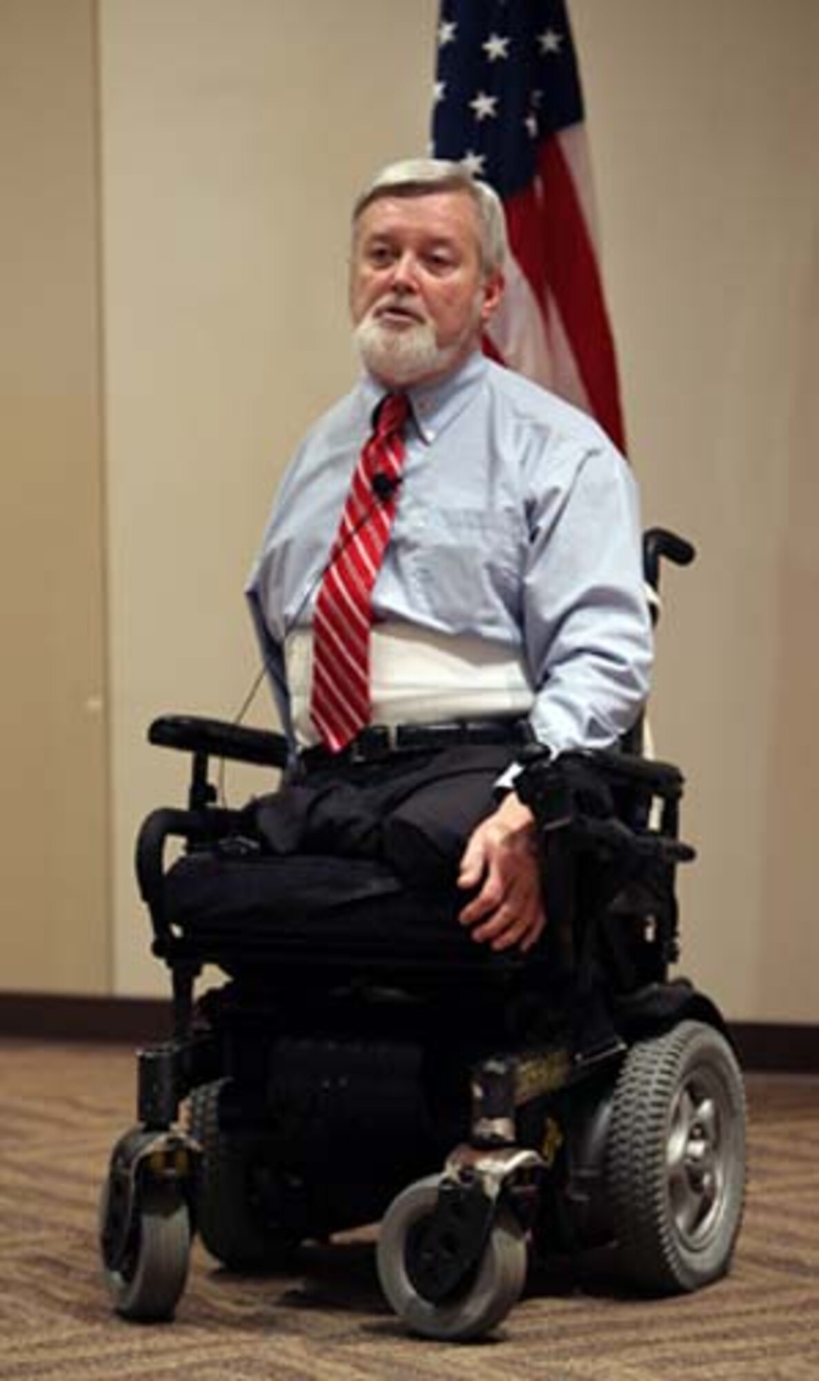 Mr. Tommy Clack, former U.S. Army Captain, speaks during the National Disabilities Employment Awareness Month luncheon Oct. 24, 2011, at Buckley Air Force Base, Colo. Clack is a heroic Vietnam combat veteran who has endured 65 surgeries since his injuries in Cambodia in 1969, and has been working veteran issues for more than 41 years. (U.S. Air Force photo/Quinn Jacobson)
