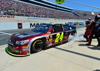 Jeff Gordon, driver of the No. 24 Drive to End Hunger Chevrolet, speeds out of the pits after a pit stop June 1, 2014 during the FedEx 400 at the Dover International Speedway in Dover, Del. Gordon finished the race in 15th place after qualifying number six. (U.S. Air Force photo/Airman 1st Class William Johnson)