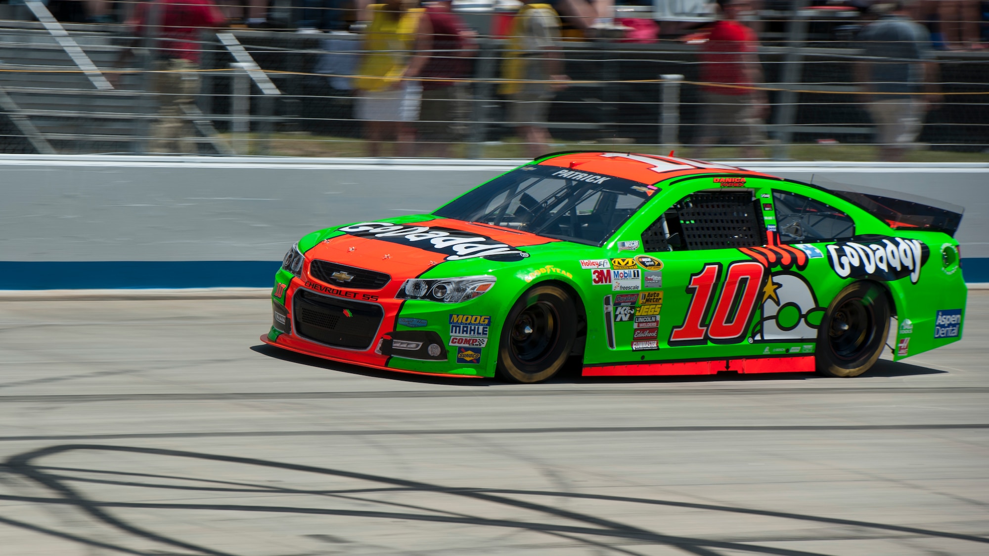 Danica Patrick, driver of the No. 10 GoDaddy.com Chevrolet, speeds down the track during the NASCAR Sprint Cup Series FedEx 400 benefiting Autism Speaks June 1, 2014, at Dover International Speedway in Dover, Del. Patrick would go on to finish the race in 23rd place. (U.S. Air Force photo/Airman 1st Class Zachary Cacicia)