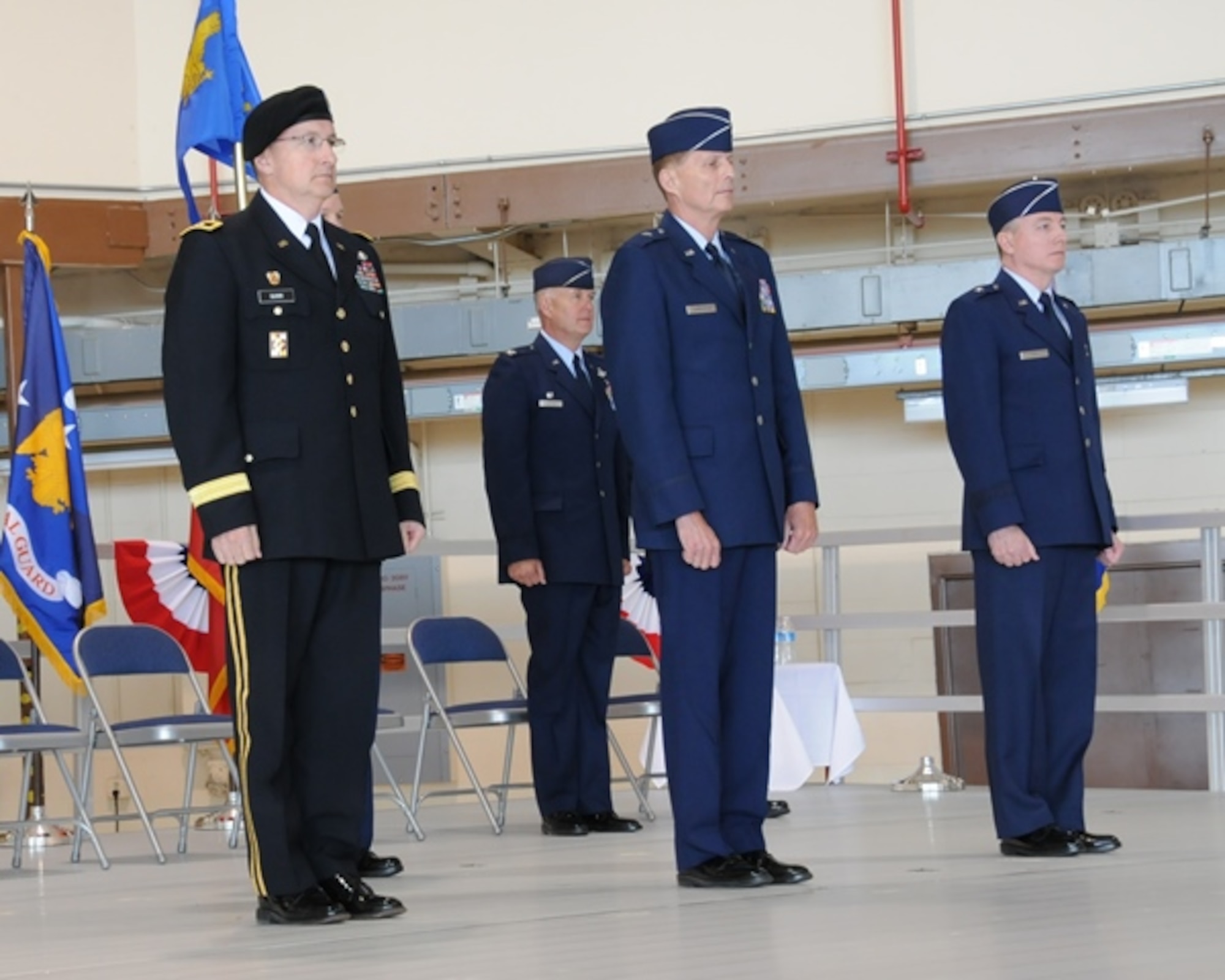 Maj. Gen. Matthew Quinn, Adjutant General of Montana (left), Brig. Gen. Brad Livingston, Montana Air National Guard commander (center), and Brig. Gen. Bryan Fox, Montana Air National Guard chief of staff, stand for a change of command ceremony at the Montana Air National Guard May 31.  Livingston relinquished command to Fox during a change of mission ceremony at the wing. (National Guard photo/Staff Sgt. Michael Touchette) 