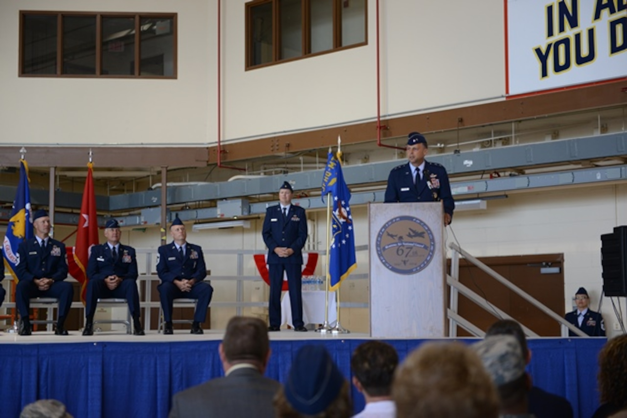 Maj. Gen. Scott Hanson, Director of Operations Air Mobility Command, speaks during a change of mission ceremony at the Montana Air National Guard May 31.  The wing officially changed from a fighter wing to an airlift wing on March 1. (U.S. Air Force photo/Senior Airman Katrina Heikkinen)