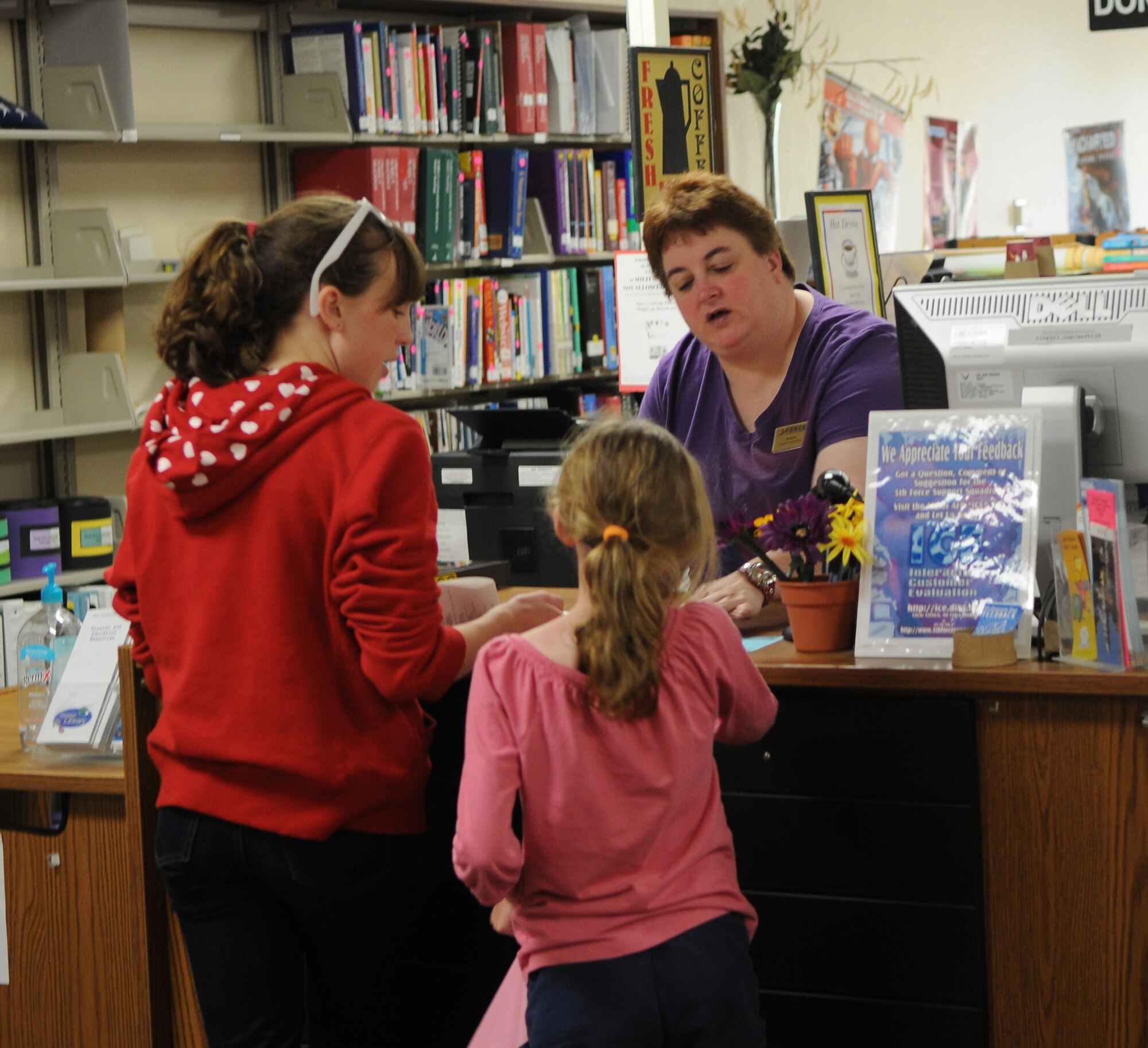 The Base Library services 46,000 customers a year. Patrons checked out
approximately 66,000 books and materials and took 135 exams through the
proctor service. The library provided 163 programs and over $1.5 million
worth of services at a cost of $240,000 to the Air Force. (Courtesy photo)
