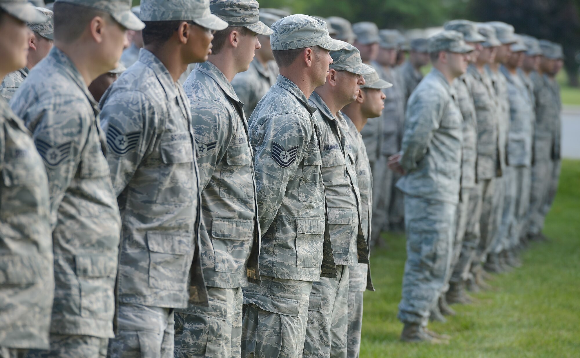 Airmen of the 436th Civil Engineer Squadron stand in formation while being addressed by Wing leadership following a formal retreat ceremony May 30, 2014, at Dover Air Force Base, Del. All sections of CES were represented in the ranks of the formation. (U.S. Air Force photo/Greg L. Davis) 