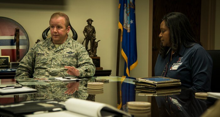 Col. Jeffrey DeVore talks with Joint Base Charleston leadership about the Base Exchange June 2, 2014, at the wing headquarters building on JB Charleston, S.C. The Army and Air Force Exchange Service is a joint non-appropriated fund instrumentality of the Department of Defense and is directed by a board of directors which is responsible to the Secretaries of the Army and the Air Force through the Service Chiefs of Staff.  The Exchange has the dual mission of providing authorized patrons with quality merchandise and services at competitively low prices and generating non-appropriated fund earnings as a supplemental source of funding for military morale, welfare and recreation programs. (U.S. Air force photo/ Airman 1st Class Clayton Cupit)
