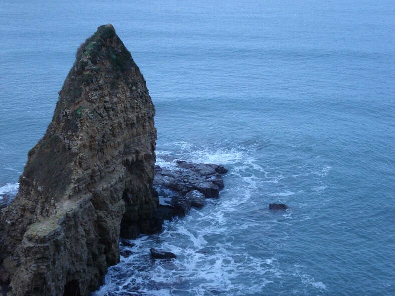 The far edge of Pointe du Hoc was the cliff U.S. Rangers climbed on D-Day in order to take out the German guns at the top of the coastline. Of the 225 men who climbed, only 90 of them could bear arms after two days of fighting. (Courtesy photo/Capt. Laura Balch/Released)