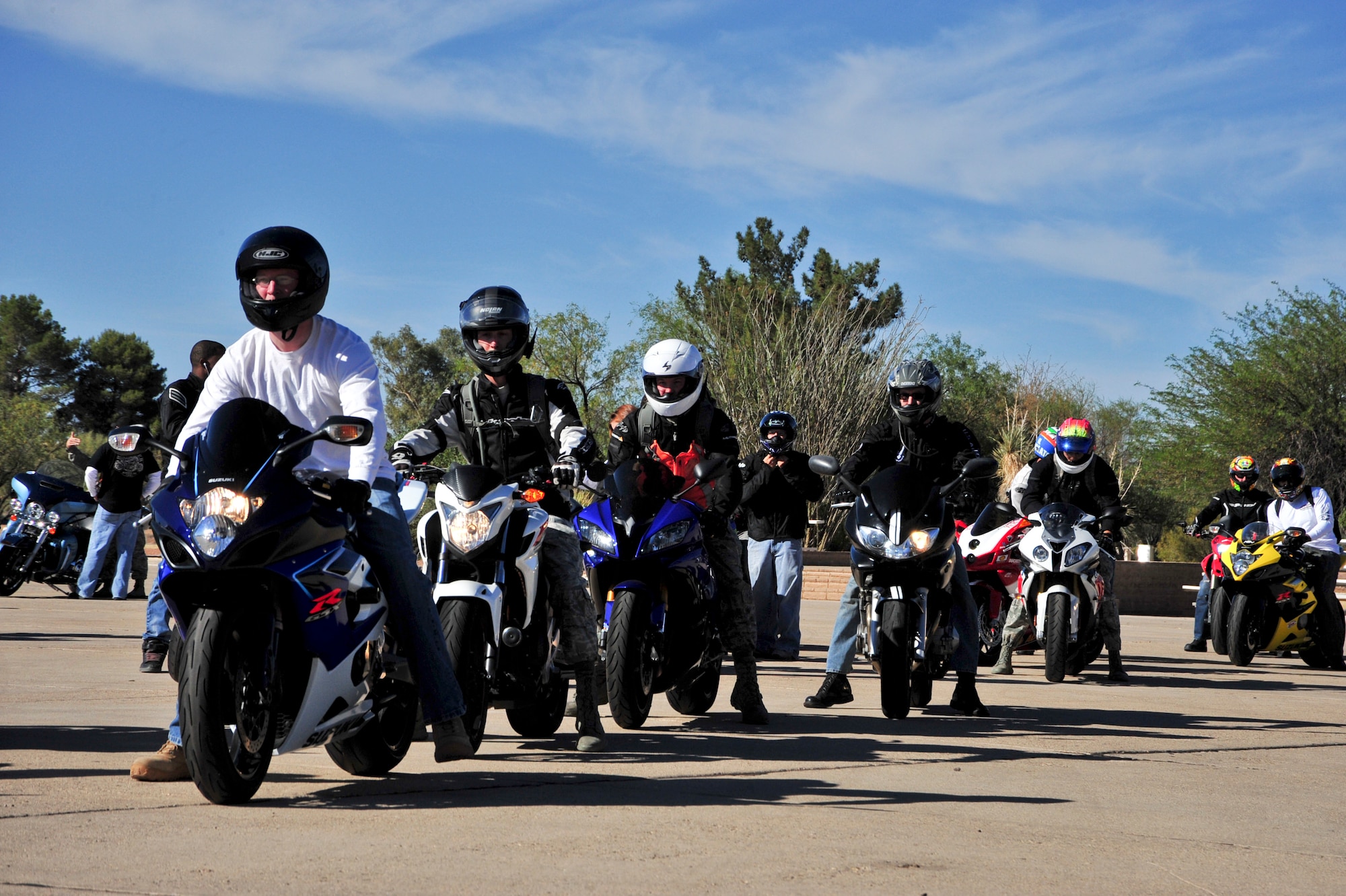Desert Lightning Team members prepare to depart from Heritage Park to begin a motorcycle mentorship ride beginning at Davis-Monthan Air Force Base, Ariz., June 2, 2014.  The ride was one of many events that Airmen were able to attend for a Social Comprehensive Airman Fitness Day. (U.S. Air Force Photo by Airman 1st Class Chris Massey/Released)