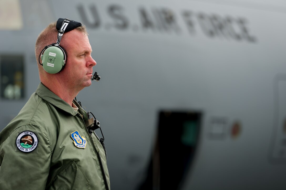 U.S. Air Force Staff Sgt. Patrick Englishby, C-130 Hercules loadmaster with the 914th Airlift Wing, Niagara Falls Air Reserve Station, N.Y., observes engine startup during Maple Flag 47 in Edmonton/Cold Lake, Alberta, Canada, May 26, 2014. Maple Flag is an international exercise designed to enhance the interoperability of C-130 aircrews, maintainers and support specialists in a simulated combat environment. (U.S. Air Force photo by Master Sgt. John R. Nimmo, Sr.)