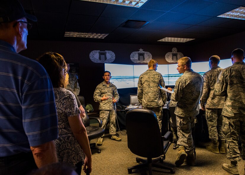 Tech. Sgt. Robert Butler, an active-duty 334th Training Squadron instructor, briefs Northwest Florida civic leaders during a tour of the 81st Training Wing’s air traffic control training school at Keesler Air Force Base, Mississippi. The visit supplemented the tour for a group of Northwest Florida civic leaders to the Air Force Reserve’s 403rd Wing at Keesler. Each year, the 919th Special Operations Wing invites local civic leaders on a tour of other Air Force Reserve units to increase their understanding of the diverse missions accomplished by the Reserve and other Department of Defense organizations.  (U.S. Air Force photo/Tech. Sgt. Jasmin Taylor)