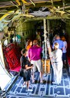 Northwest Florida civic leaders explore inside a parked WC-130J Hurricane Hunter aircraft during a tour of the Air Force Reserve’s 403rd Wing at Keesler Air Force Base, Mississippi.  Each year, the 919th Special Operations Wing invites local civic leaders on a tour of other Air Force Reserve units to increase their understanding of the diverse missions accomplished by the Reserve and other Department of Defense organizations. (U.S. Air Force photo/Tech. Sgt. Jasmin Taylor)