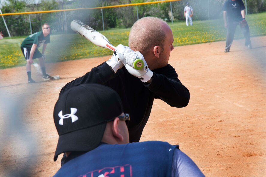 A player steps up to bat during the National Police Week softball tournament at Minot Air Force Base, N.D., May 31, 2014. The tournament, followed by a cook out, was meant to show camaraderie between military law enforcement and local law enforcement. (U.S. Air Force photo/Airman 1st Class Lauren Pitts) 