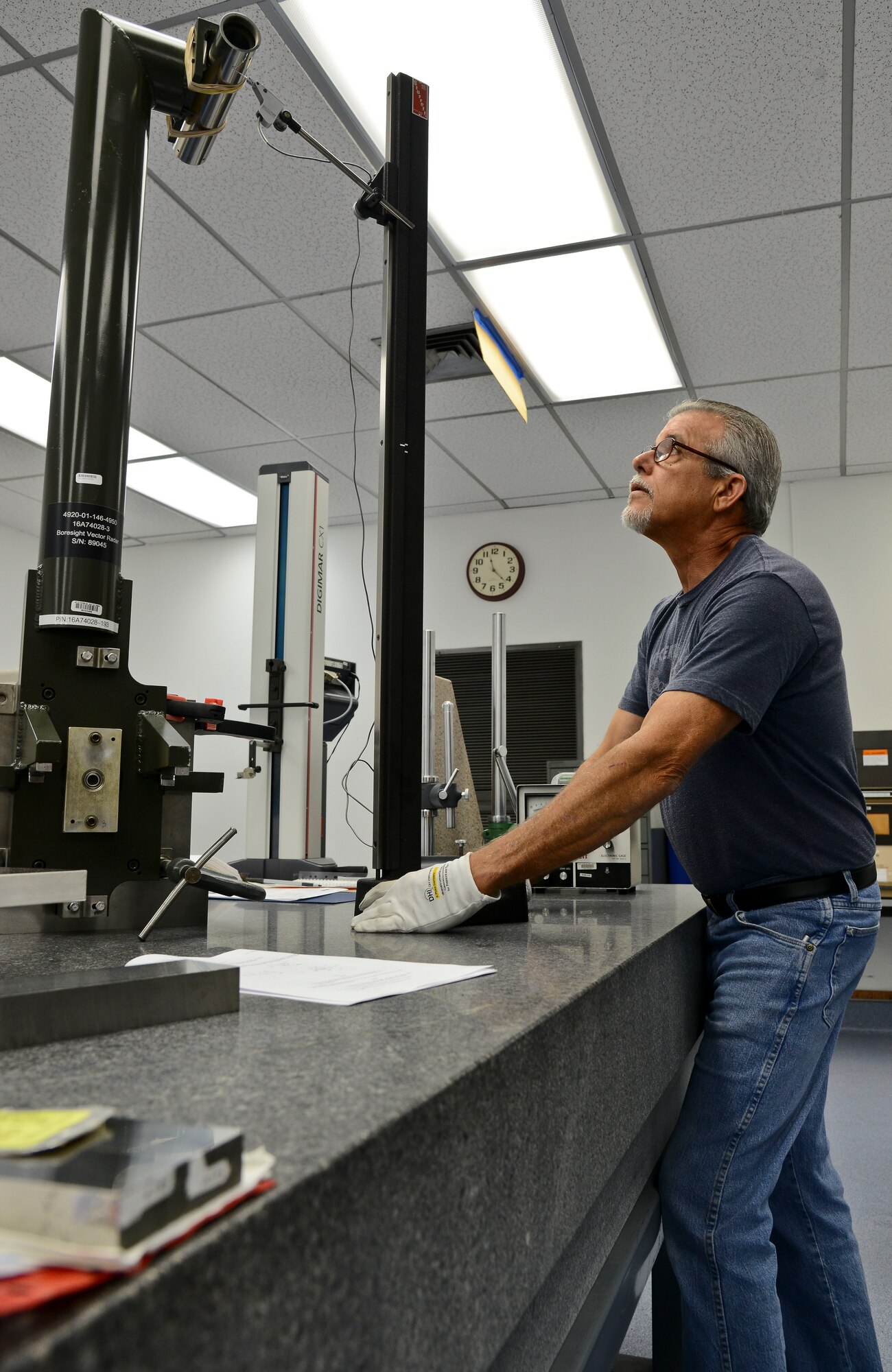 Dave McGranahan, 6th Maintenance Squadron precision measurement equipment laboratory technician, uses an electronic height gage to check the parallelism of a vector radar boresight fixture Q2 May 27, 2014, MacDill Air Force Base, Fla. The vector radar boresight fixture Q2 was sent from Homestead Air Reserve Base, Fla., to MacDill’s PMEL technicians for its biennial maintenance inspection. (U.S. Air Force photo by Airman 1st Class Ned T. Johnston/Released)