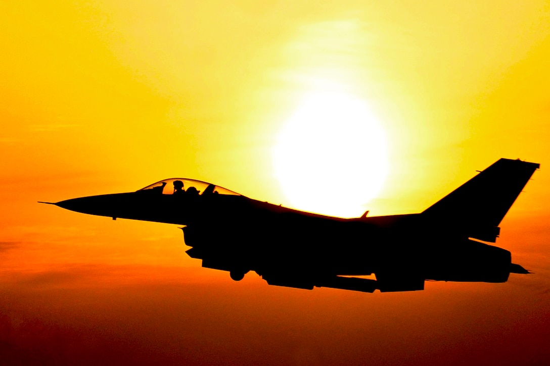 An F-16 Fighting Falcon launches at dawn during a Peninsula Operational Readiness Exercise on Kunsan Air Base, South Korea, March 20, 2012. The exercise ensures service members are capable of performing their duties in wartime conditions.  
