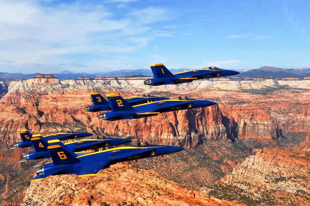 Navy pilots assigned to the Blue Angels, the Navy's flight demonstration squadron, fly in a Delta formation over Zion National Park near St. George, Utah, March 14, 2012. The Blue Angels were in Utah for the first time in 30 years to perform in an air show.  
