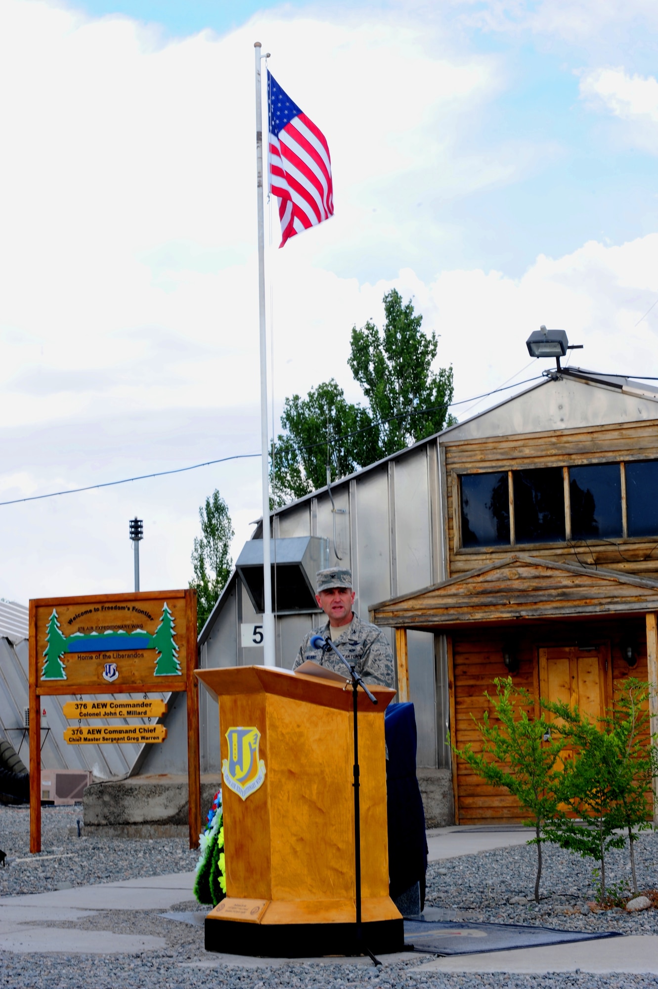 Col. John Millard speaks during the 376th Air Expeditionary Wing's inactivation ceremony June 3, 2014, at Transit Center at Manas, Kyrgyzstan. At the height of operations, approximately 1,500 U.S. military personnel were assigned to the wing, along with approximately 900 U.S. and host-nation contractor personnel who provided daily support to various base missions. Millard is the commander of the 376th AEW. (U.S. Air Force photo/Lt. Col. Max Despain)