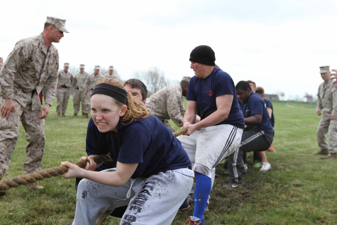 U.S. Marine Corps poolees with Recruiting Sub-Station Mount Clemens work as a team to win a tug-of-war game during Recruiting Station Detroit's annual pool function at Lake Erie Metropark, May 3, 2014. More than 350 Recruiting Station Detroit Marines and poolees from across the 14,000-square miles of southeastern Michigan and western Ohio participated in the pool function. For poolees this is an opportunity to put their physical and mental strength to the test and build camaraderie within their recruiting sub-station. RSS Mount Clemens went on to win the overall trophy after competing in more than five field meet type events. (U.S. Marine Corps photo by Sgt. Elyssa Quesada/Released)