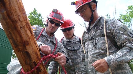 Army National Guard Soldiers assigned to the Missouri Chemical, Biological, Radiological, Nuclear and high Explosive (CBRNE) Task Force learn how to tie knots during a training May 17, 2014, at Boone County (Missouri) Training Center.