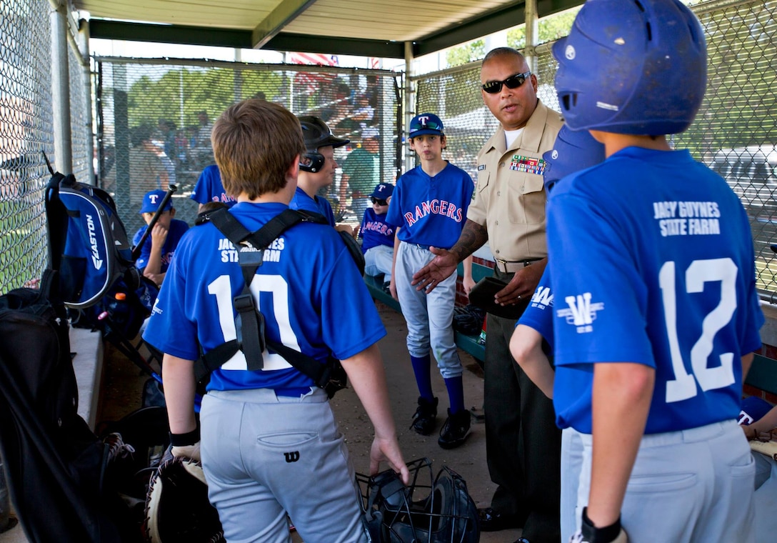 During Weatherford Little League's Armed Forces Day, Master Sgt. Roger Martinez, Logistics Chief with the 8th Marine Corps District, received the first ever 1st Lt. Jack Knight Community Service Award for his involvement with the league as the Rangers' coach.