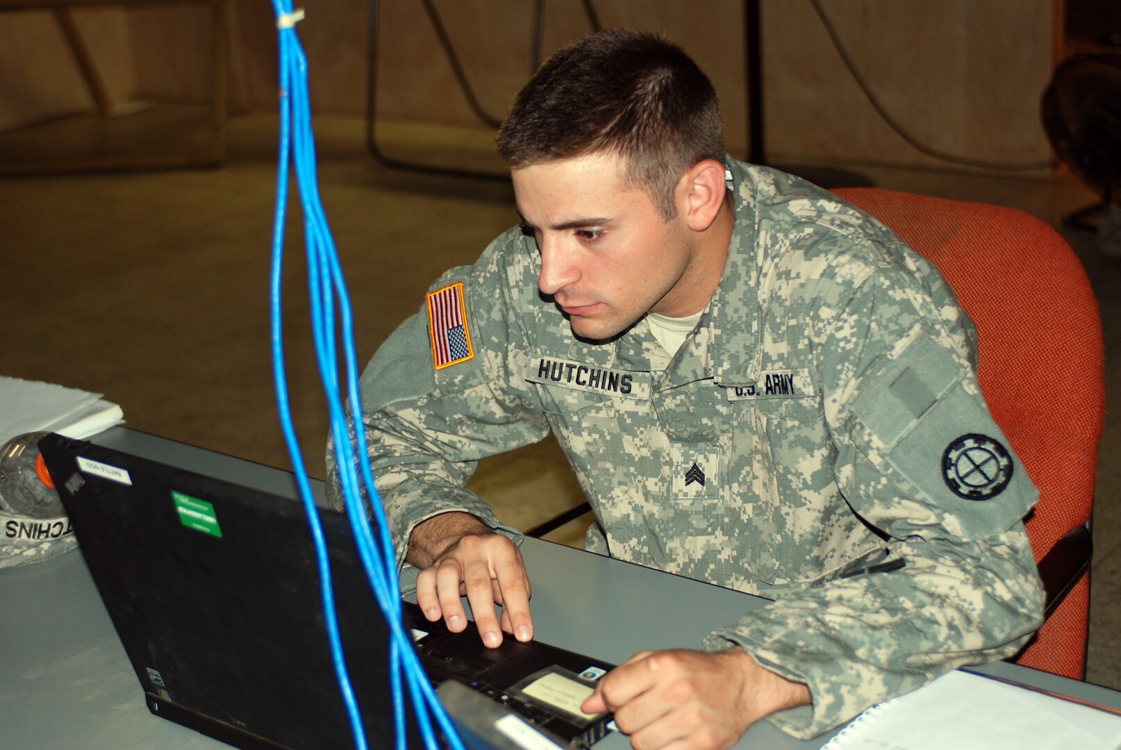 Missouri Army National Guard Sgt. Devlin Hutchins works on his computer serving as the S-3 operations noncommissioned officer during his two-week annual training mission in support of Beyond the Horizon 2012. Hutchins is a noncommissioned officer with the 1140th Engineer Battalion of the Missouri National Guard. U.S. Army South, in partnership with Honduras, is conducting various medical and civic action programs, providing focused humanitarian assistance
