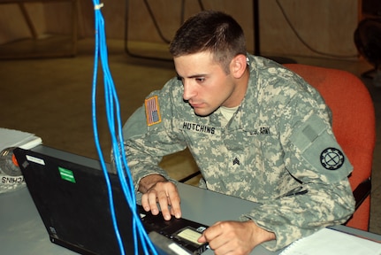 Missouri Army National Guard Sgt. Devlin Hutchins works on his computer serving as the S-3 operations noncommissioned officer during his two-week annual training mission in support of Beyond the Horizon 2012. Hutchins is a noncommissioned officer with the 1140th Engineer Battalion of the Missouri National Guard. U.S. Army South, in partnership with Honduras, is conducting various medical and civic action programs, providing focused humanitarian assistance