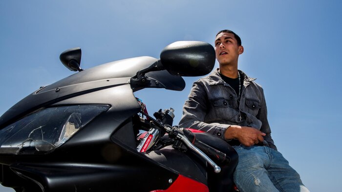 Lance Cpl.  Julio J. Rodriguez, field wireman, 15th Marine Expeditionary Unit, has been riding since he was 17 and plans to continue riding as long as he can aboard Camp Pendleton, Calif. Rodriguez, 22, is from Springfield, Mass. (U.S. Marine Corps photo by Cpl. Emmanuel Ramos/Released)